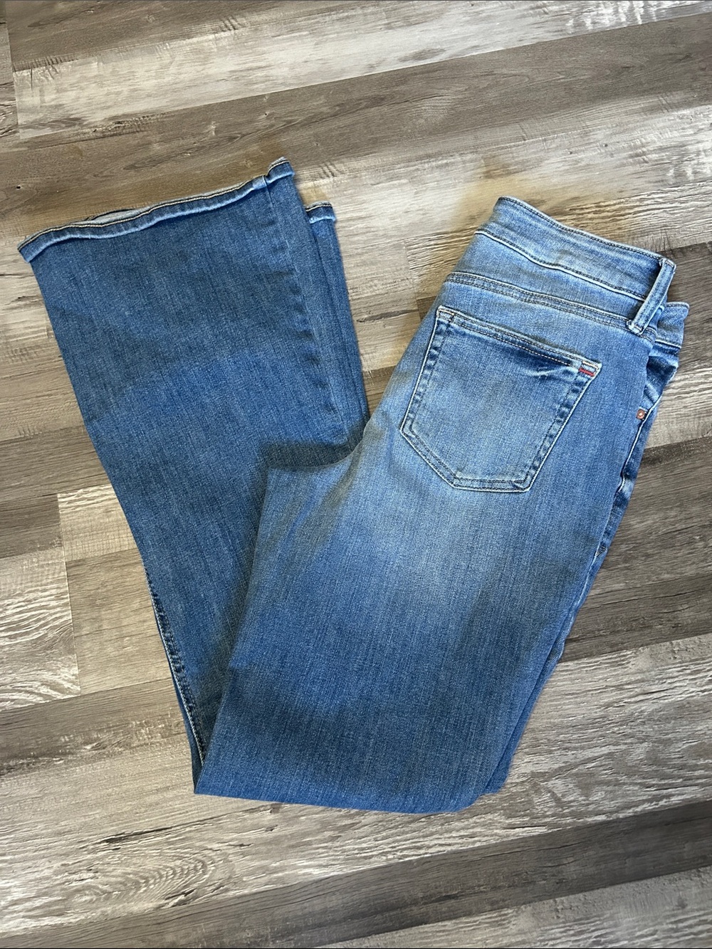 High-Rise Blue Flare Jeans with Subtle Fade